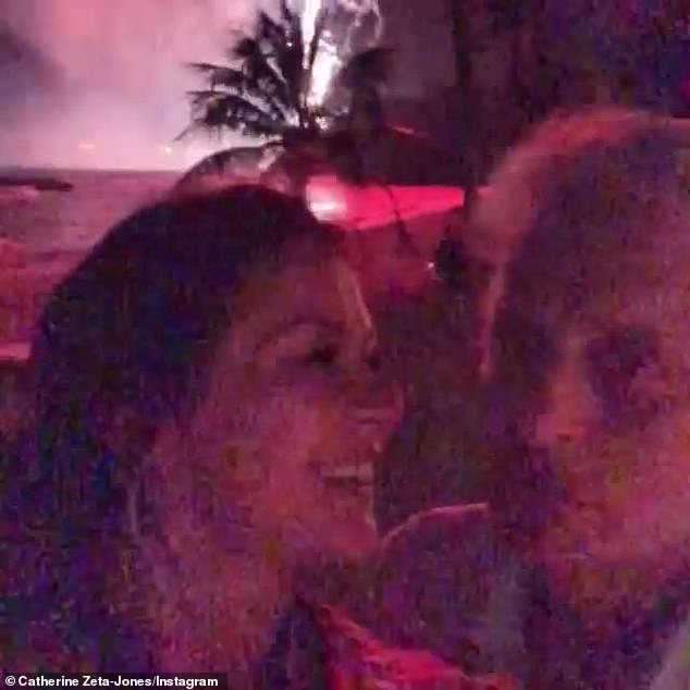 Seaside: Fireworks erupted in the background as the New Jersey-born 74-year-old and the 49-year-old Welshwoman rang in 2019 in paradise