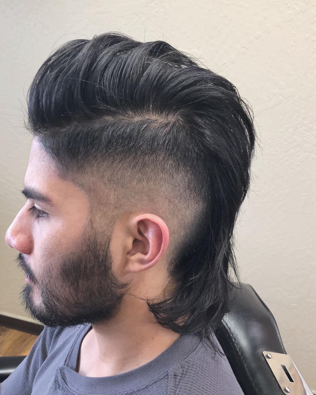 Pompadour mullet haircut