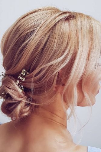 wedding hairstyle ideas for short hair low bun on blonde with baby breath hairbyhannahtaylor